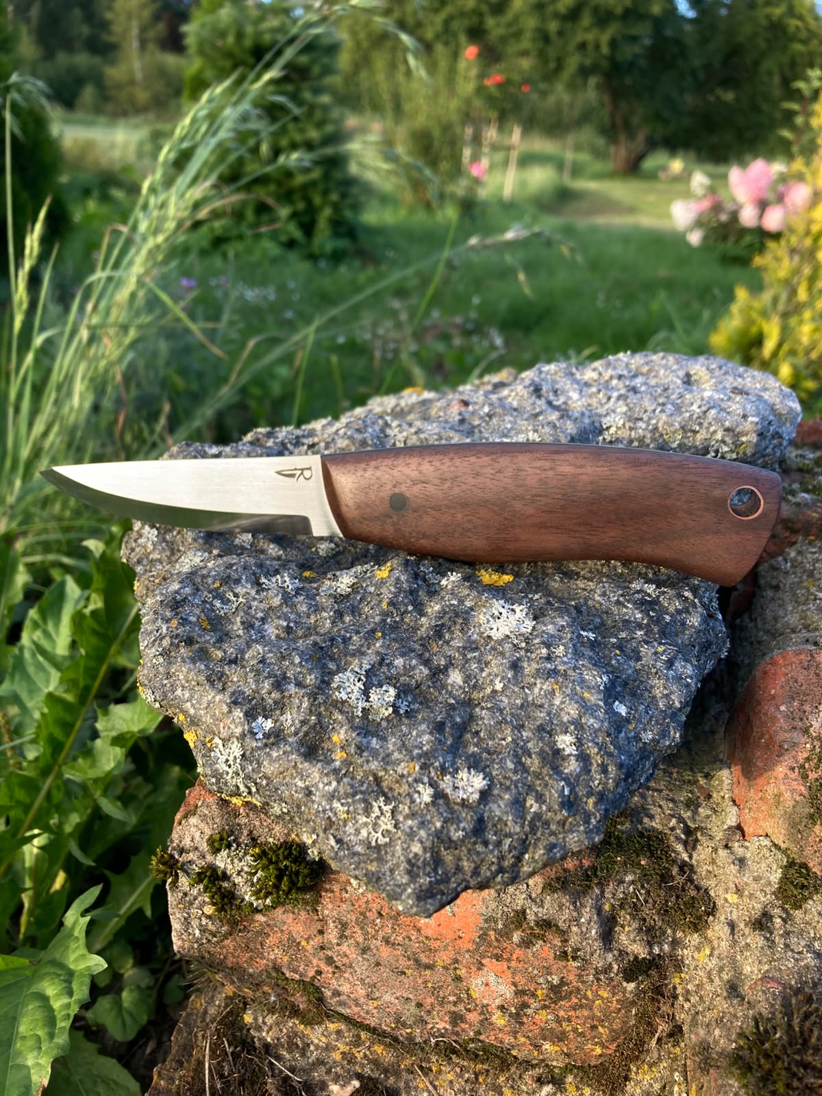 Bushcraft knife full view on stone