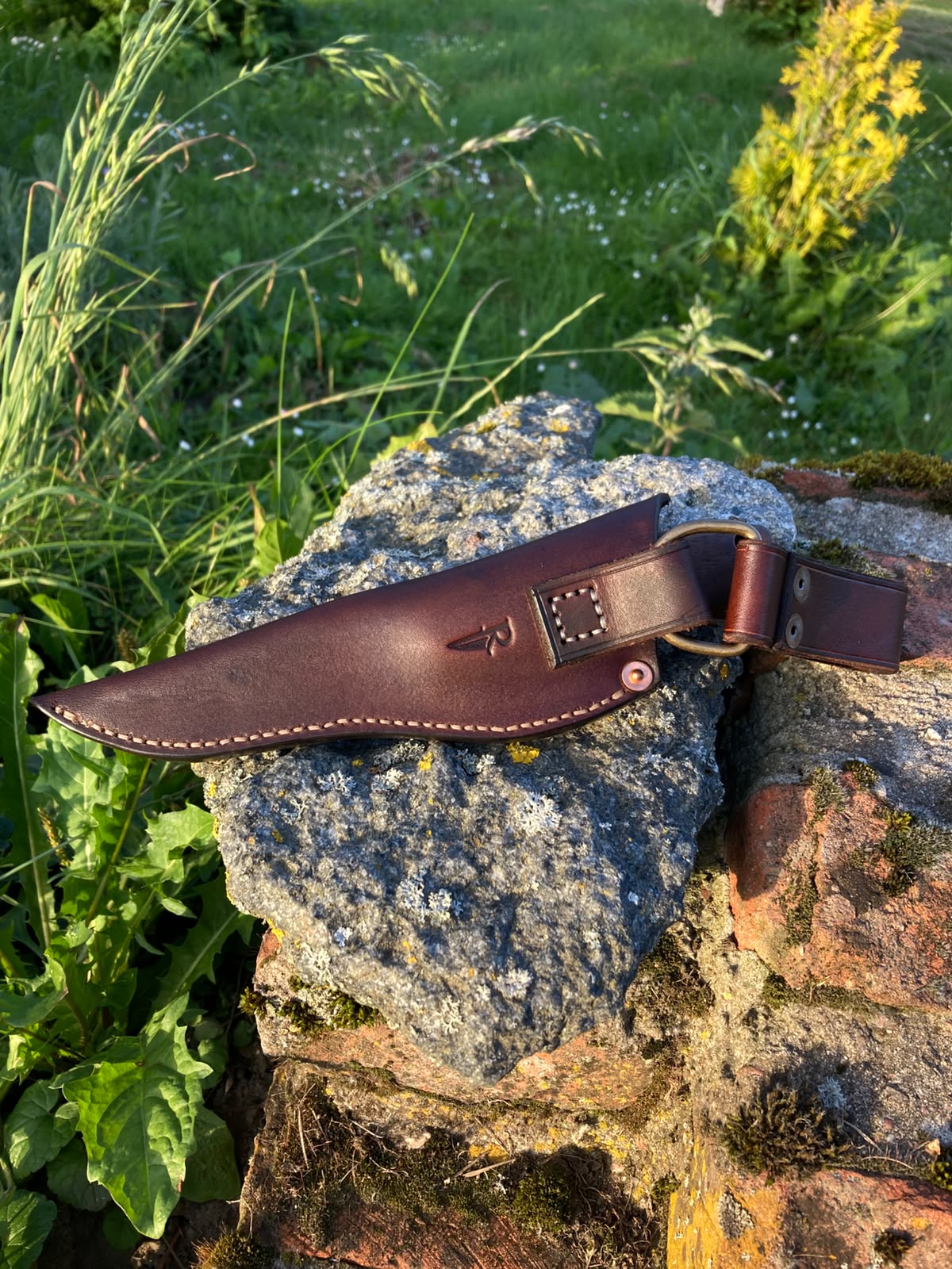 Leather sheath back view with belt loop