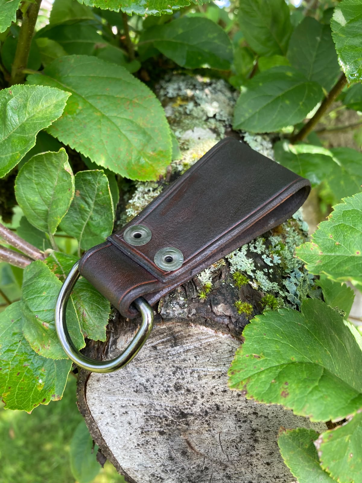 Dark brown leather dangler side view